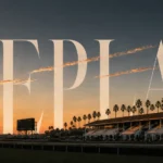 Empty racetrack at dusk under editorial cover typography reading replay